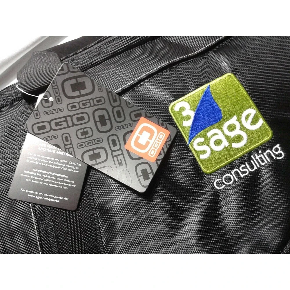 OGIO Voyager Messenger Bag 117023-fits Laptop, MacBk- 3 Sage Consulting embossed